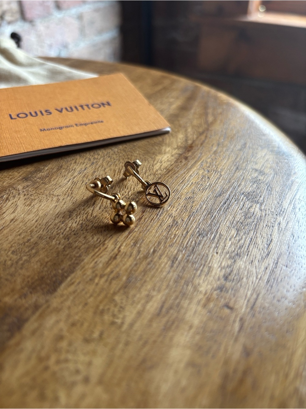 Louis Vuitton Gold Mini LV beaded hoop “Blooming Earrings”.